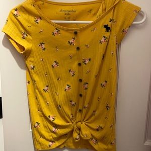 Yellow cropped shirt